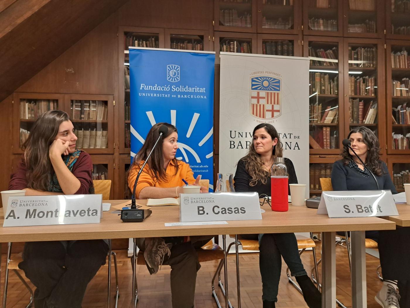 four women are presenting at a panel discussion in the University of Barcelona