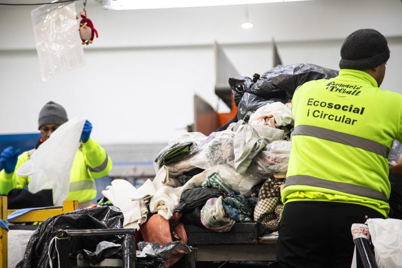 Clothes at Fundació i Treball’s plant on the outskirts of Sabadell (Catalonia, Spain), one of the largest textile sorting facilities in Southern Europe.