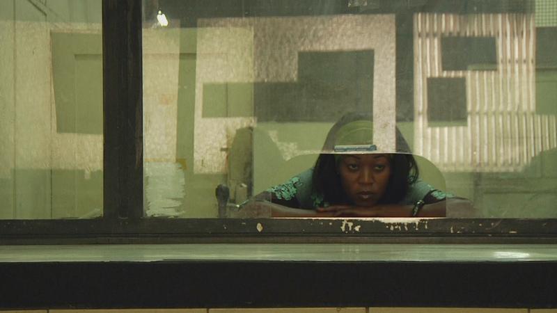 Henriette behind the counter