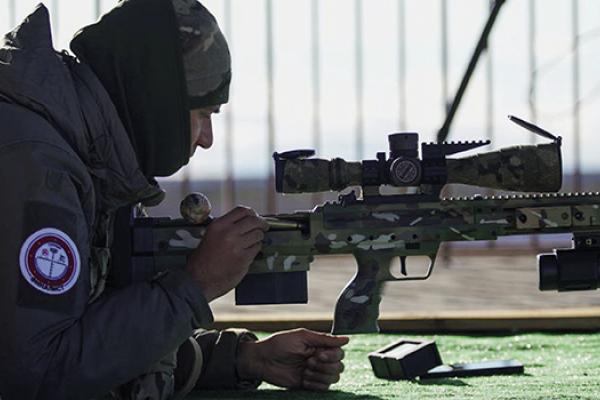 a Russian sniper armed with a US-made DesertTech .37XC rifle